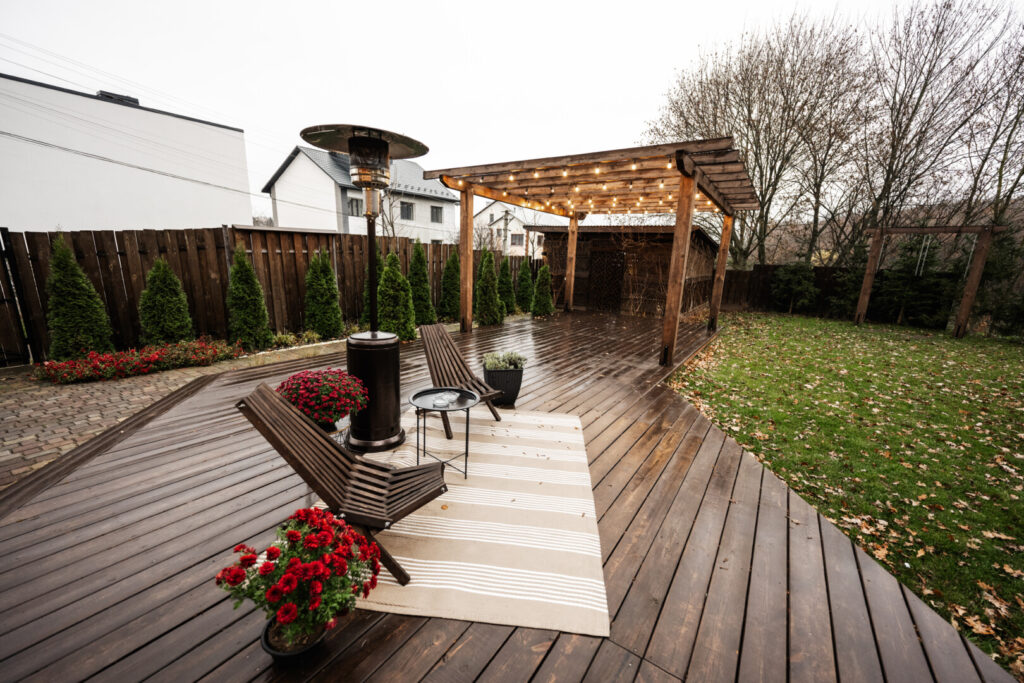 Wooden patio with pergola and outdoor seating